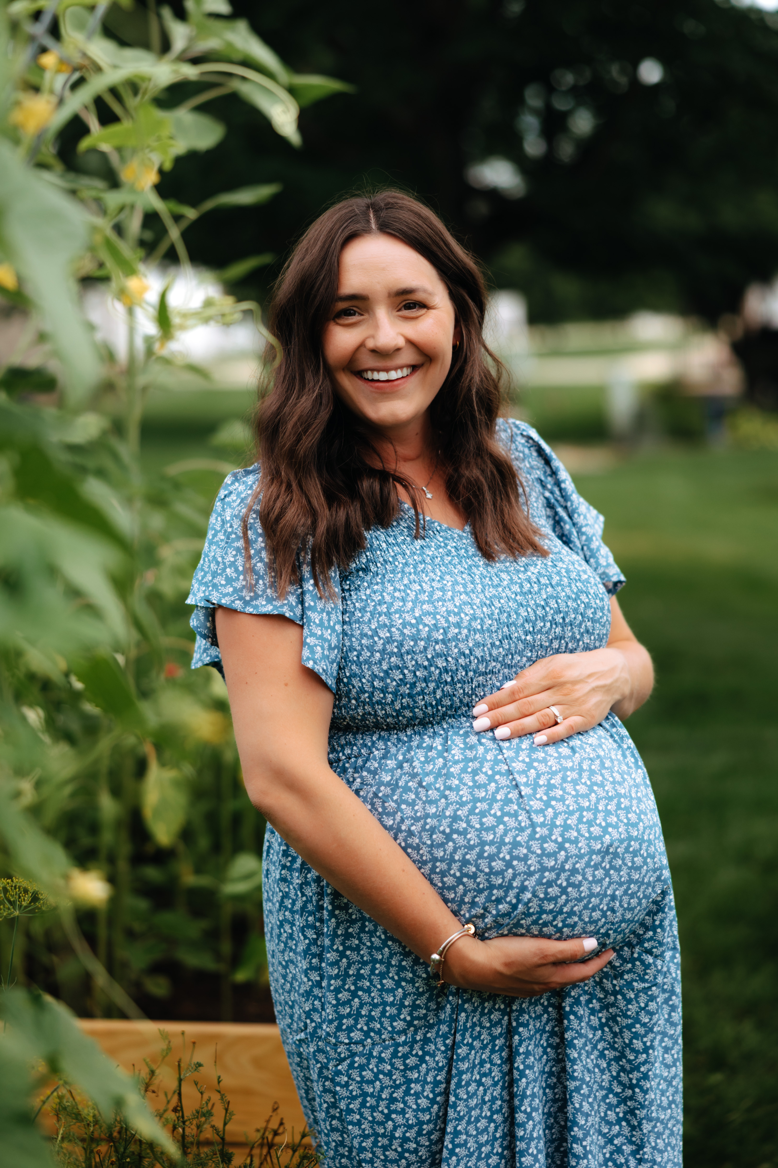 Sara Sladky headshot - woman smiling with brown hair